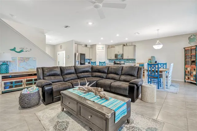 a living room with furniture and a couch
