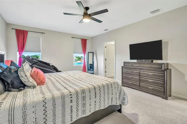 a spacious bathroom with a granite countertop sink a mirror and a