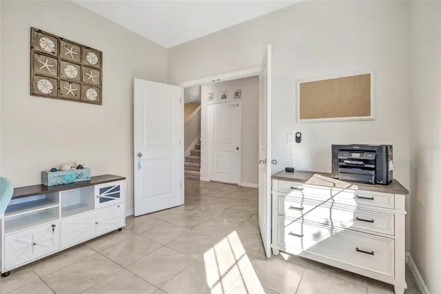 a kitchen with stainless steel appliances a stove a refrigerator and cabinets