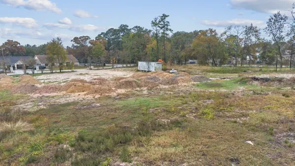 a view of a lake from a yard