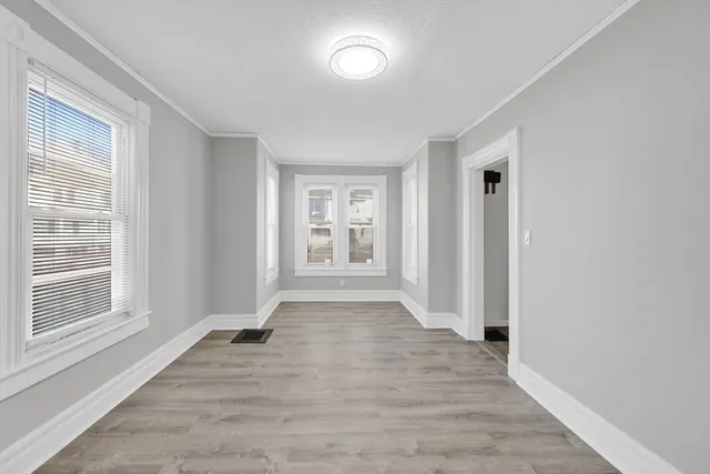 a kitchen with a white cabinets and white appliances