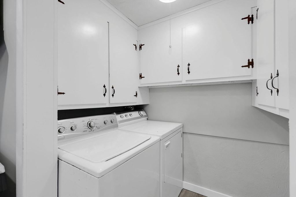140-142 Dickinson Street Springfield, MA 01108 - Photo 26 of 42 a view of utility room with washer and dryer
