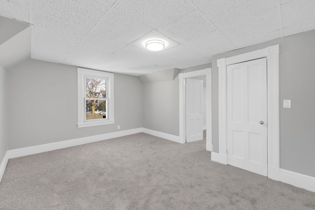 140-142 Dickinson Street Springfield, MA 01108 - Photo 33 of 42 a view of an empty room with a window