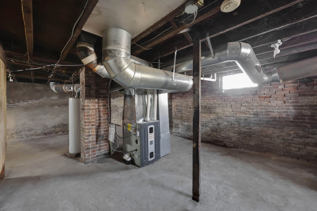 140-142 Dickinson Street Springfield, MA 01108 - Photo 37 of 42 a view of water heater room