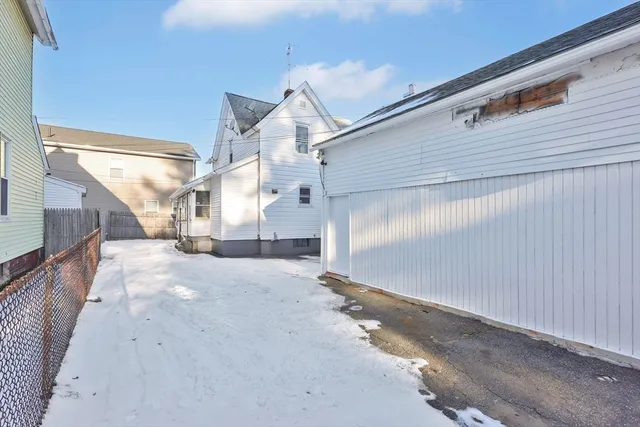 a view of a house with a snow