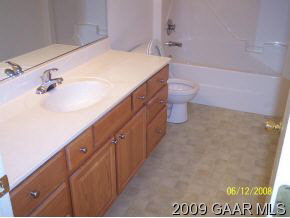 225 Inglecress Road Waynesboro, VA 22980 - Photo 6 of 7 a bathroom with a double vanity sink toilet and vanity