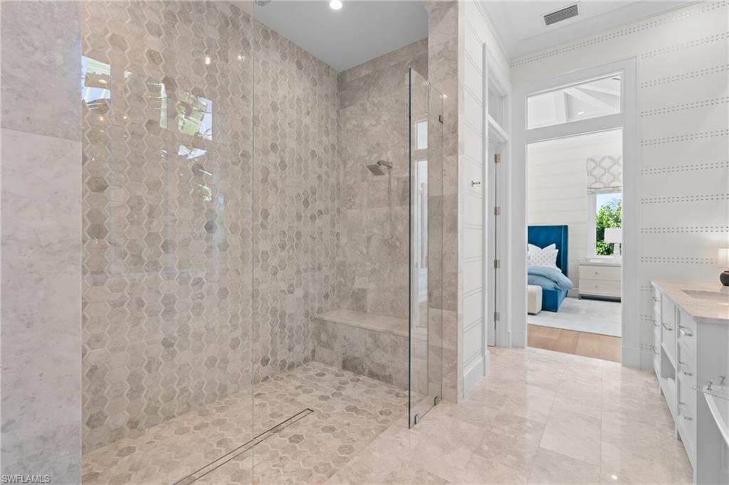 4511 Crayton Road Naples, FL 34103 - Photo 12 of 28 a bathroom with a shower