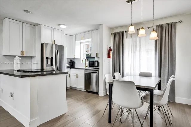 a childrens park with lots of swings and slides