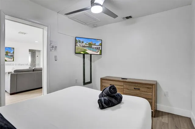 an aerial view of a house with a garden and plants