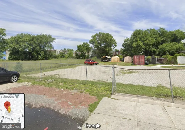 a view of a road with a yard