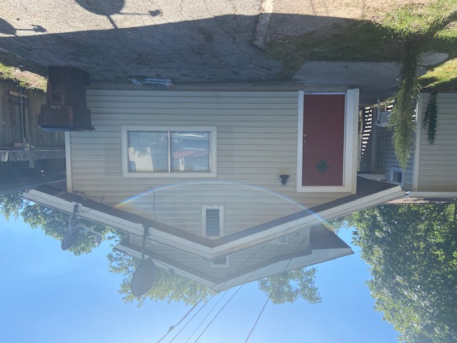 417 South Commerce Street, Unit B Lockhart, TX 78644 - Photo 2 of 9 View of bungalow-style house. Driveway parking and off-street