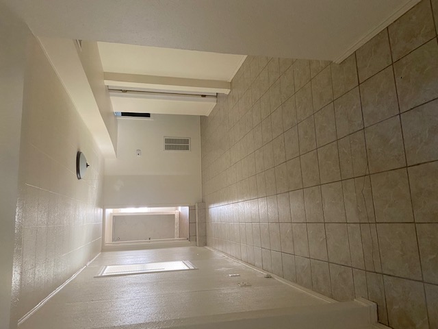 417 South Commerce Street, Unit B Lockhart, TX 78644 - Photo 3 of 9 Living Room with tile floors.
