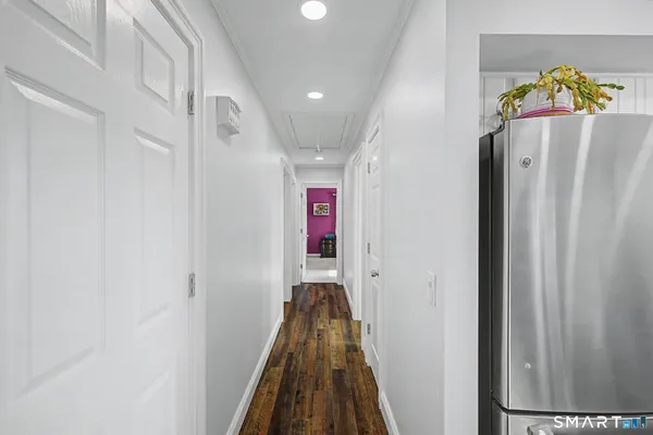 a view of a hallway with painted walls