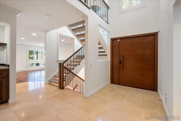 a view of an entryway with a front door