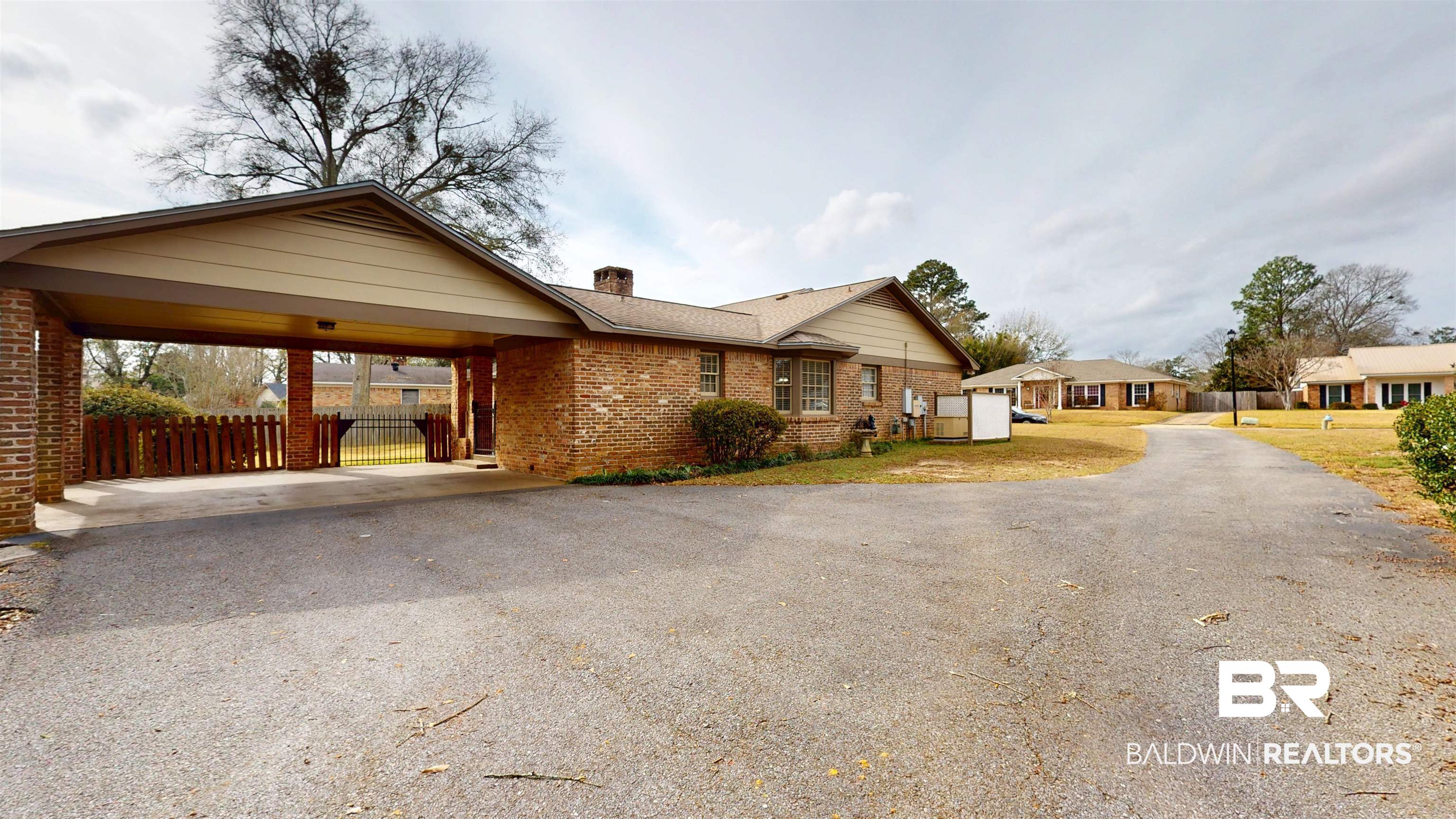 609 Burlington Court Mobile, AL 36608 - Photo 19 of 19 Single story home featuring driveway, brick siding, a chimney, and a residential view