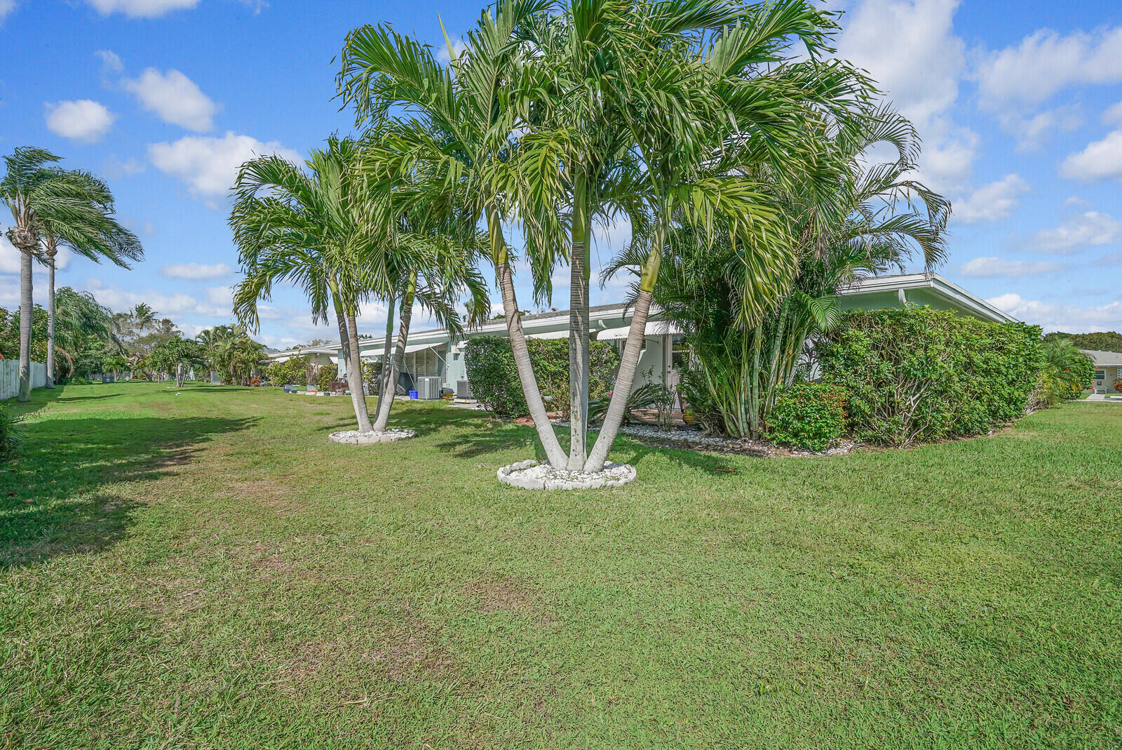 202 West High Point Terrace, Unit A Delray Beach, FL 33445 - Photo 30 of 55 a view of a yard with a slide