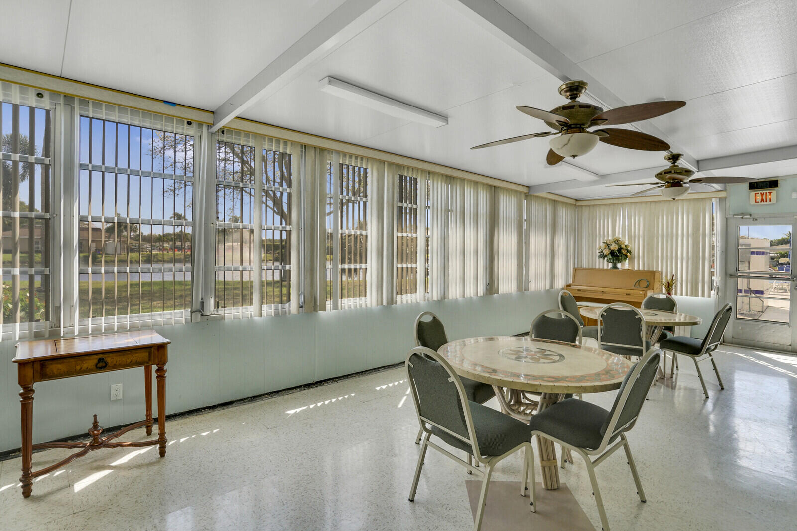 202 West High Point Terrace, Unit A Delray Beach, FL 33445 - Photo 46 of 55 a dining room with furniture and window
