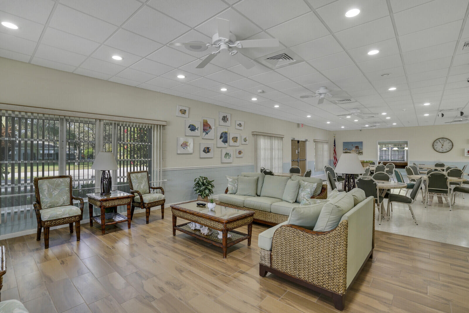 202 West High Point Terrace, Unit A Delray Beach, FL 33445 - Photo 47 of 55 a living room with furniture and a wooden floor