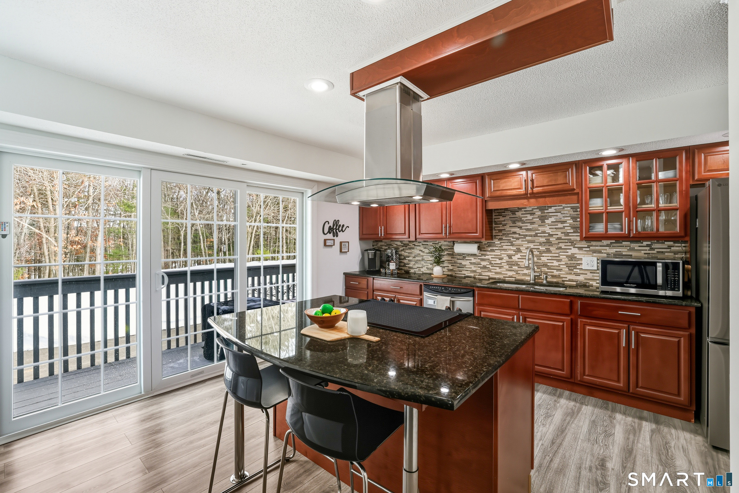 20 Wolf Hill Road, Unit 1A Wolcott, CT 06716 - Photo 11 of 36 Gorgeous gourmet kitchen with oversized French doors leading to the deck - so much natural light!