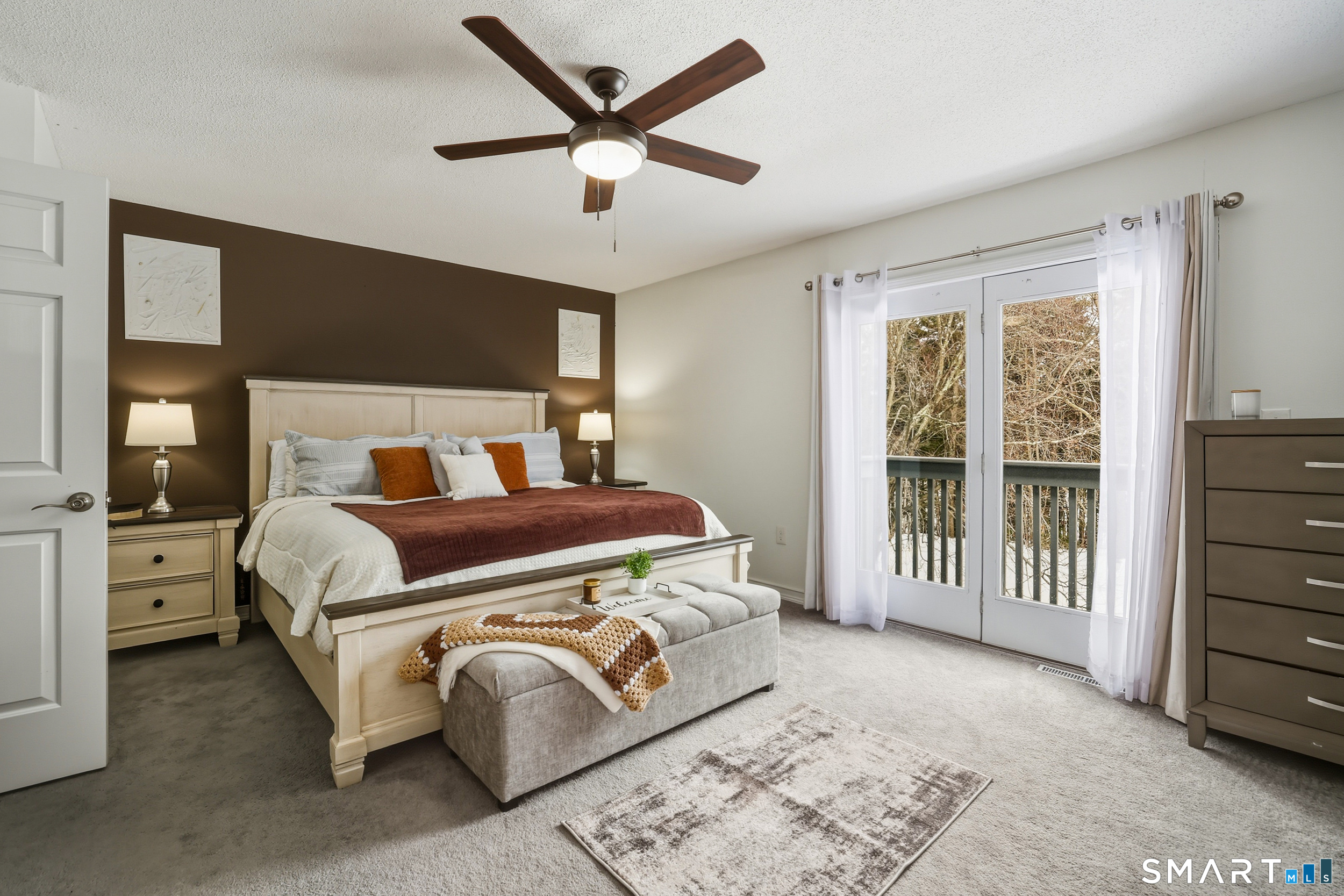 20 Wolf Hill Road, Unit 1A Wolcott, CT 06716 - Photo 17 of 36 Spacious primary bedroom with sliders to a private balcony