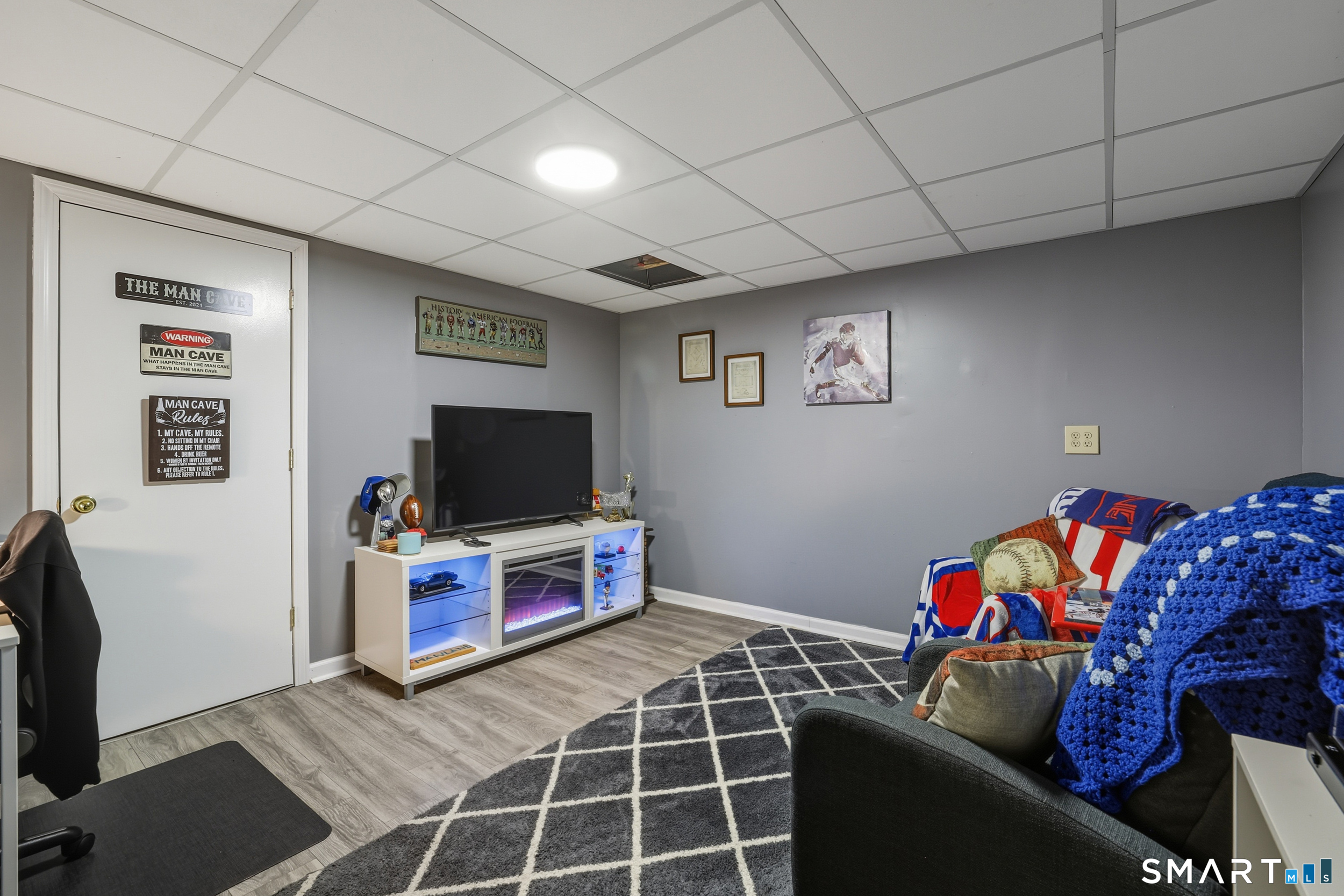 20 Wolf Hill Road, Unit 1A Wolcott, CT 06716 - Photo 27 of 36 Finished room in the lower level - perfect man cave, rec room or playroom!