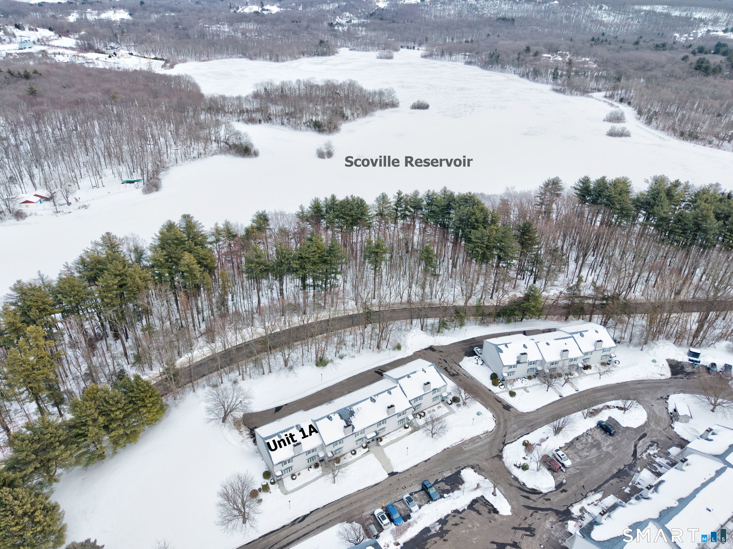 20 Wolf Hill Road, Unit 1A Wolcott, CT 06716 - Photo 30 of 36 Drone view of the property - showing the reservoir and walking trail across the street - great location and breathtaking views!