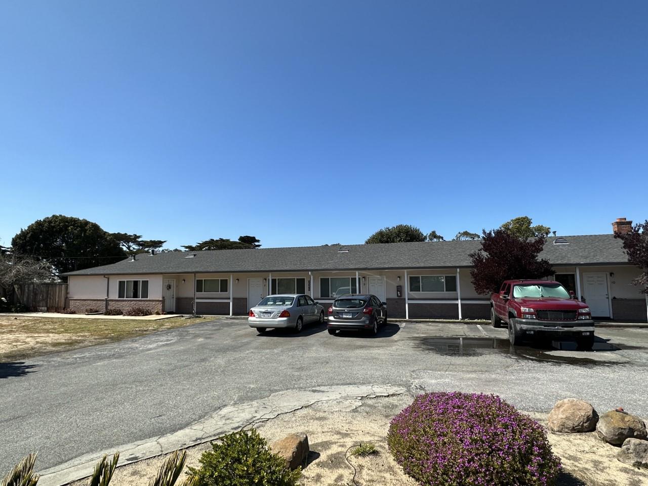 226 Harben Circle Marina, CA 93933 - Photo 2 of 15 a front view of a building with cars parked