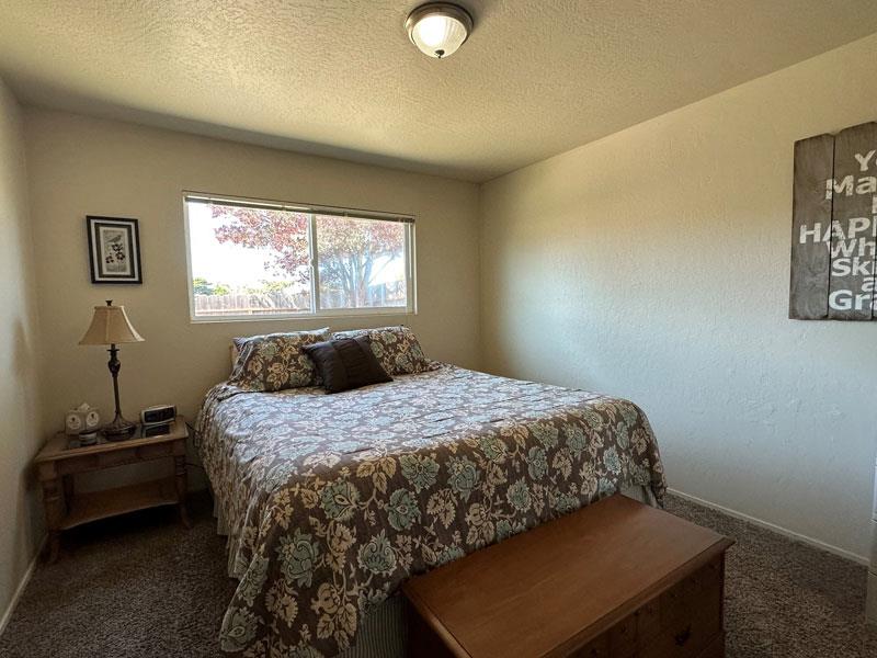 226 Harben Circle Marina, CA 93933 - Photo 9 of 15 a bedroom with a bed and a window