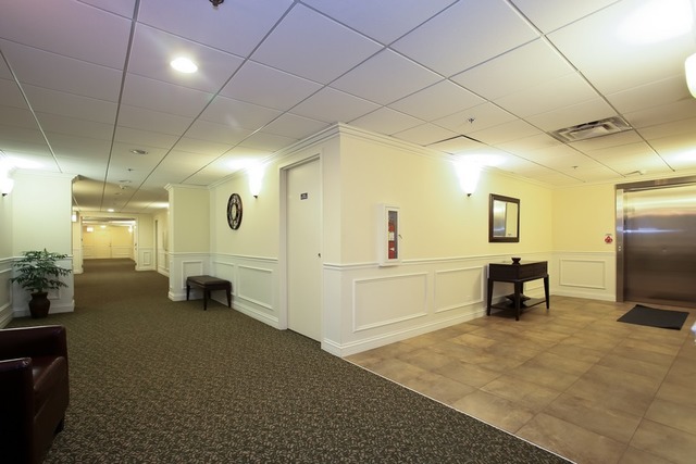 310 South Main Street, Unit 208 Lombard, IL 60148 - Photo 13 of 15 a view of a room with gym equipment
