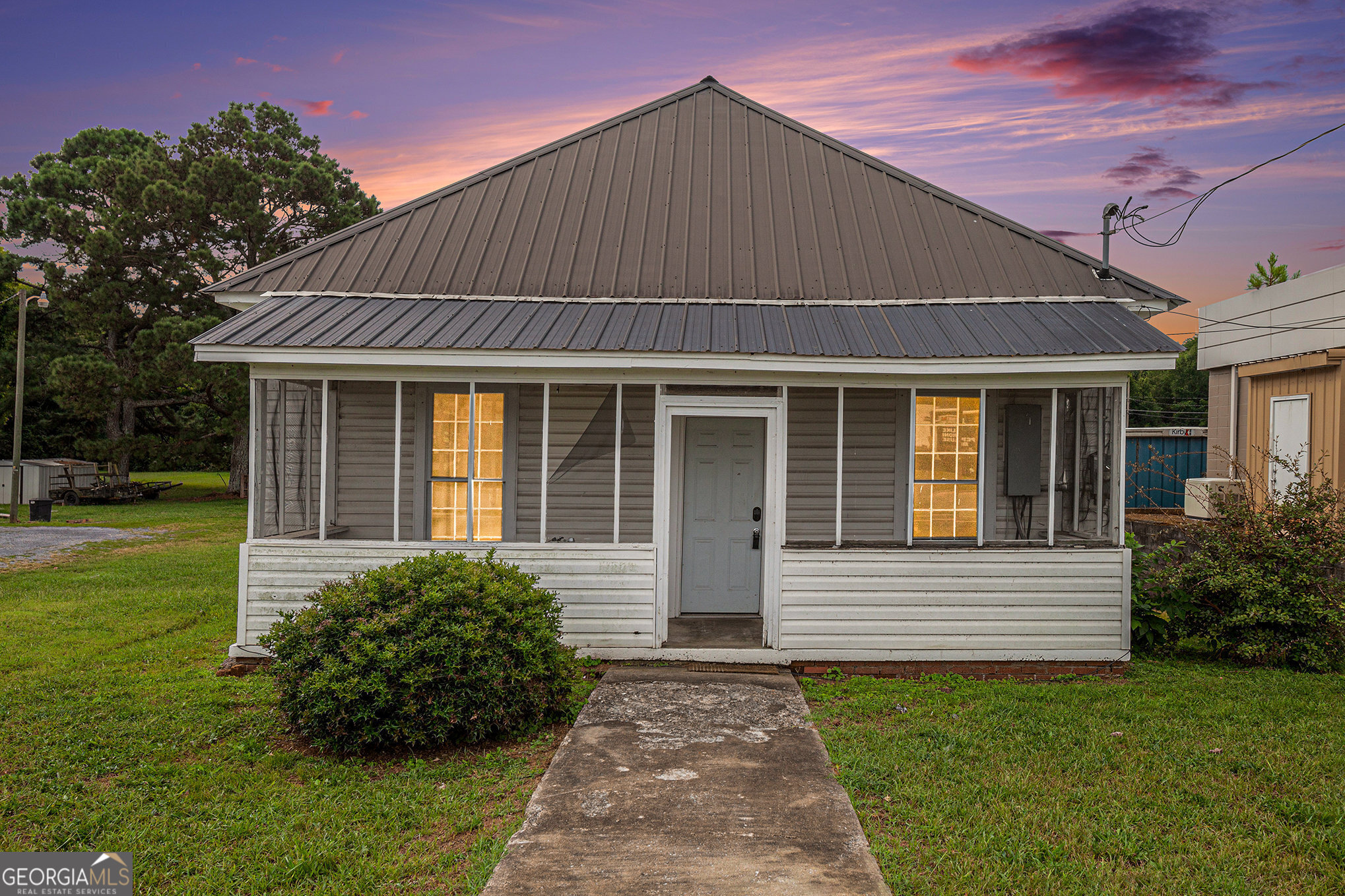 324 West Line Street Calhoun, GA 30701 - Photo 1 of 1 a front view of a house with garden