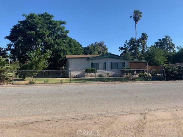 22231 Grove Road Wildomar, CA 92595 - Photo 1 of 1 a front view of a house with trees