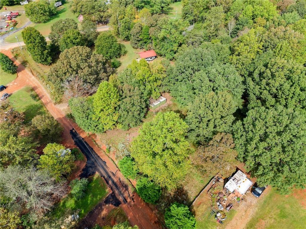 99 Rocket Drive Cleveland, GA 30528 - Photo 3 of 12 an aerial view of residential house with outdoor space and trees all around