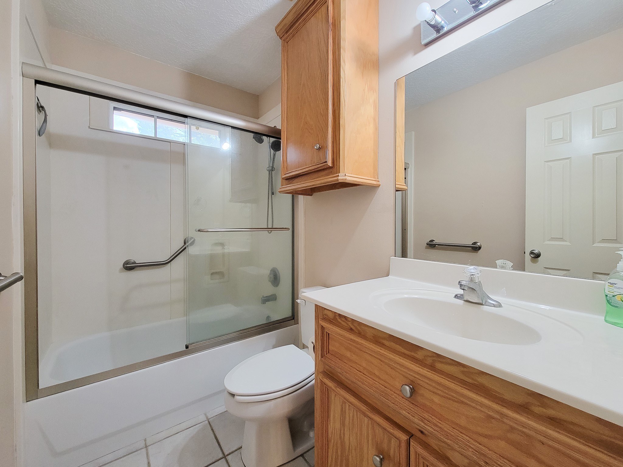 1000 Shell Avenue Cleveland, TX 77327 - Photo 20 of 34 a bathroom with a sink a toilet and shower
