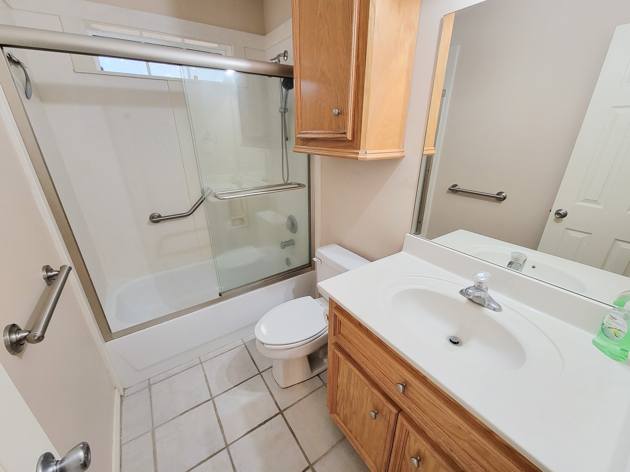 1000 Shell Avenue Cleveland, TX 77327 - Photo 21 of 34 a bathroom with a sink toilet and shower