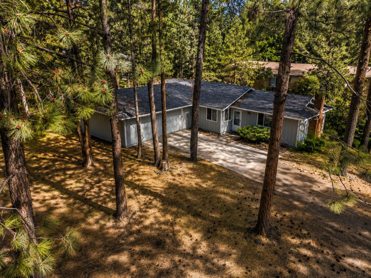 19968 Double Tree Court Bend, OR 97702 - Photo 24 of 28 a view of house with a backyard