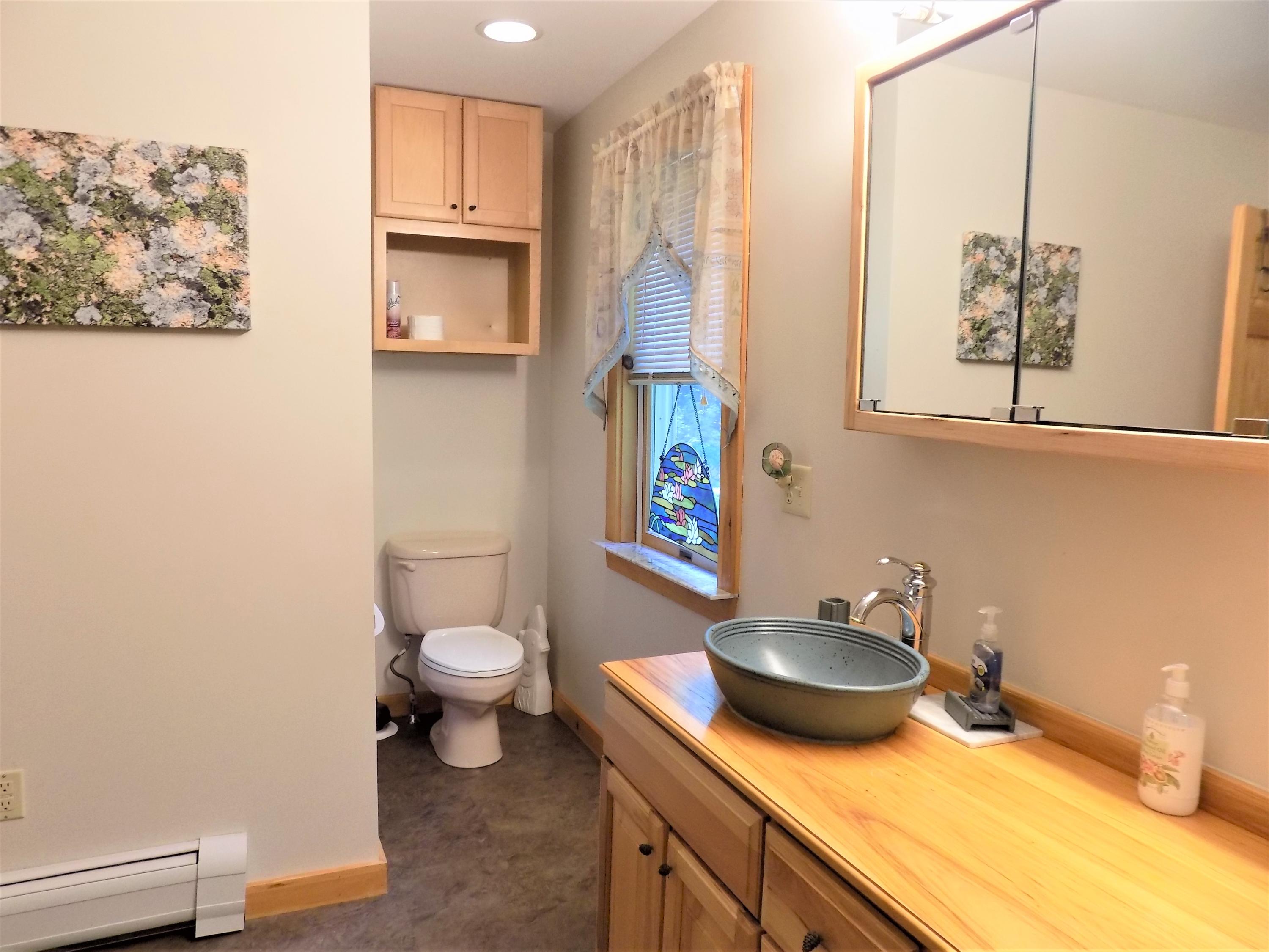 171 Long Point Way Orland, ME 04472 - Photo 26 of 63 primary bedroom ensuite