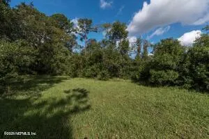 a view of outdoor space and yard