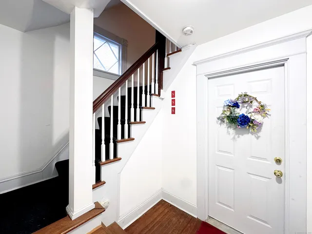 a kitchen with stainless steel appliances a stove sink and a refrigerator