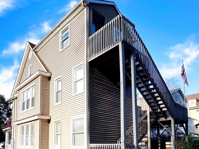 a balcony with an outdoor space