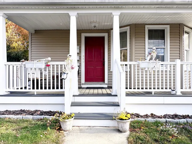 a porch with seating space