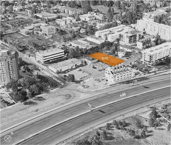 an aerial view of a city with lots of residential buildings