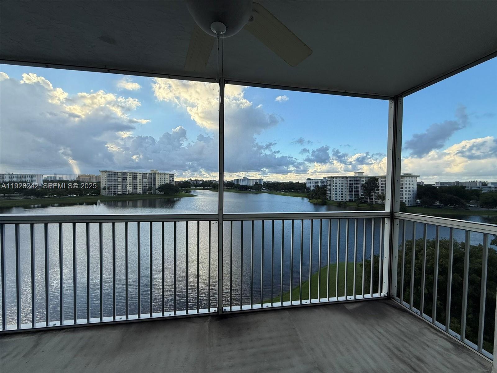 3091 North Course Drive, Unit 705 Pompano Beach, FL 33069 - Photo 29 of 30 a view of a balcony with yard