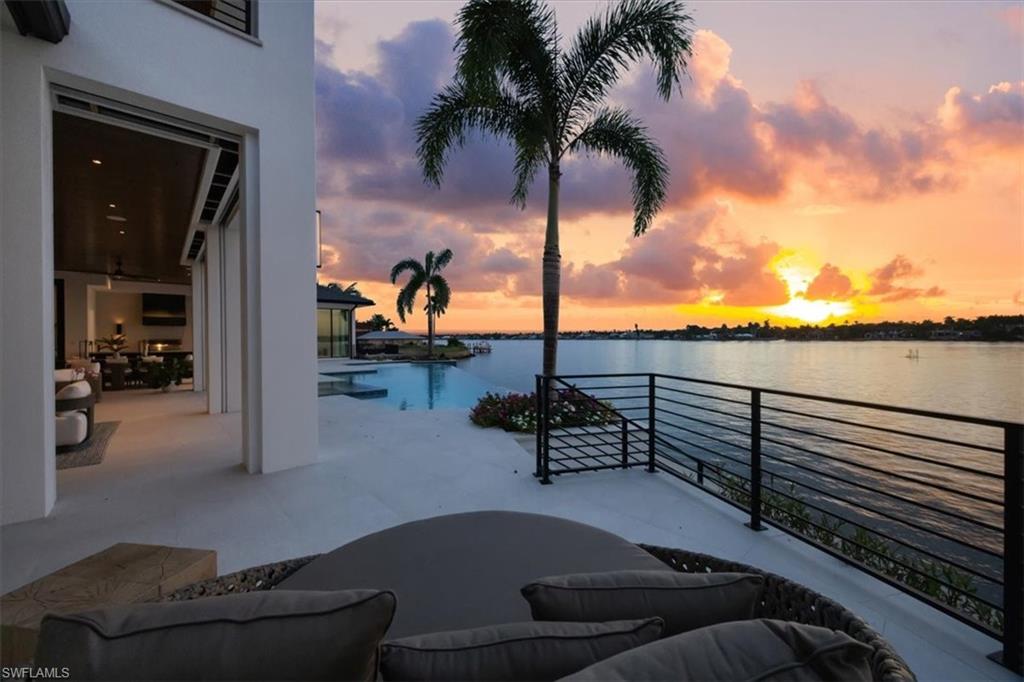 1640 Dolphin Court Naples, FL 34102 - Photo 21 of 45 a view of outdoor space with seating area
