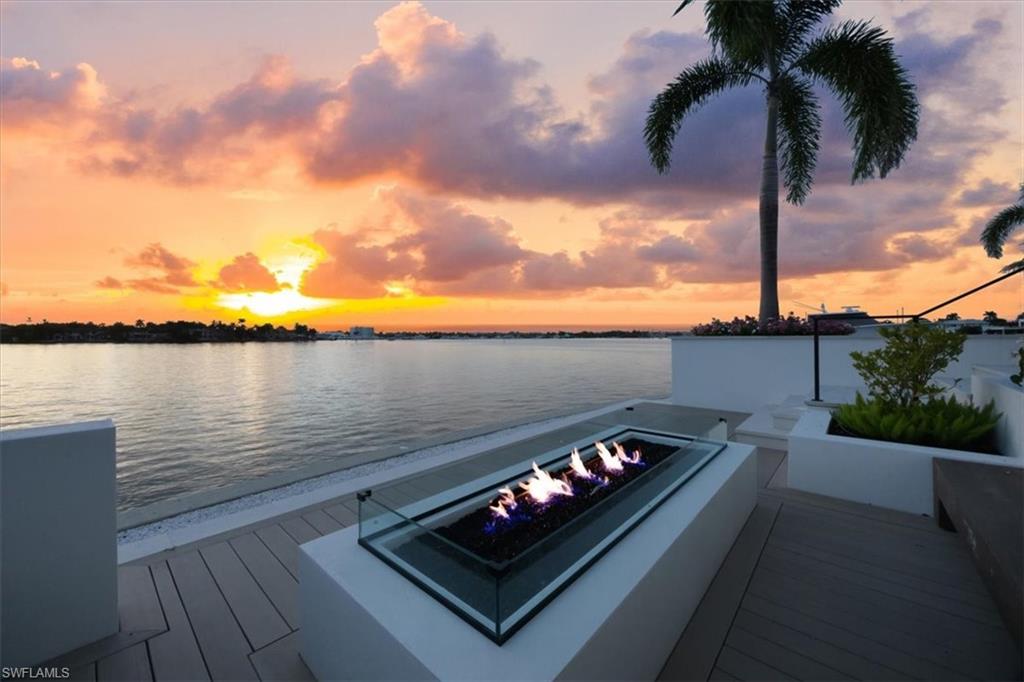 1640 Dolphin Court Naples, FL 34102 - Photo 29 of 45 a view of a terrace with hardwood