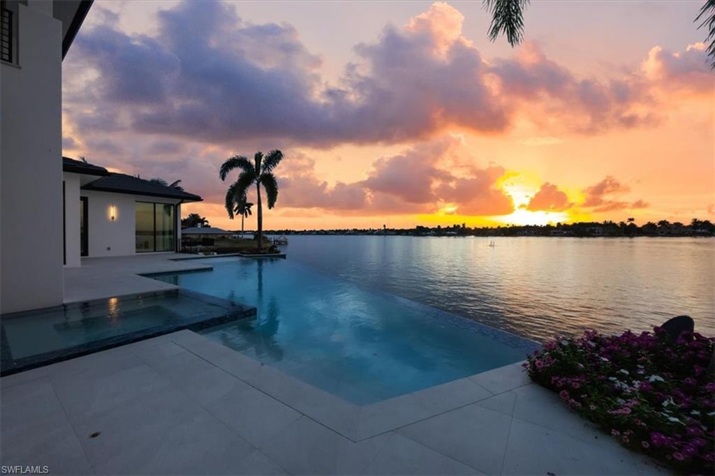 1640 Dolphin Court Naples, FL 34102 - Photo 44 of 45 a view of a lake