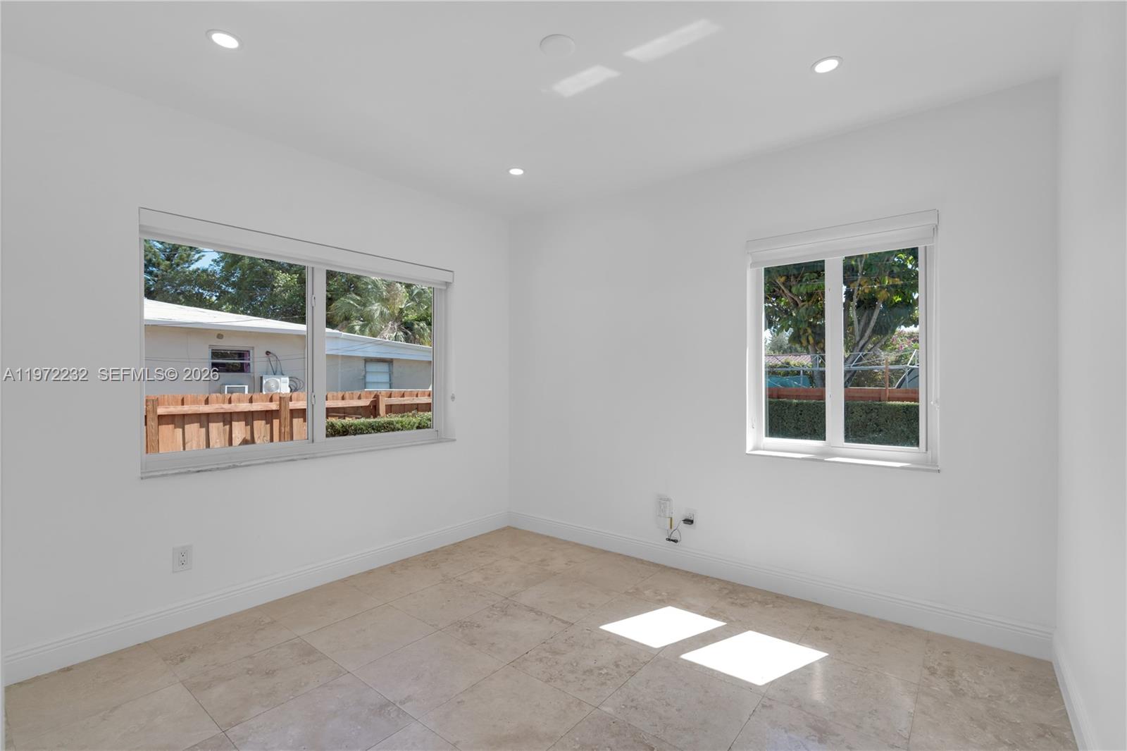 6376 Southwest 20th Street Miami, FL 33155 - Photo 17 of 42 a view of an empty room with a window