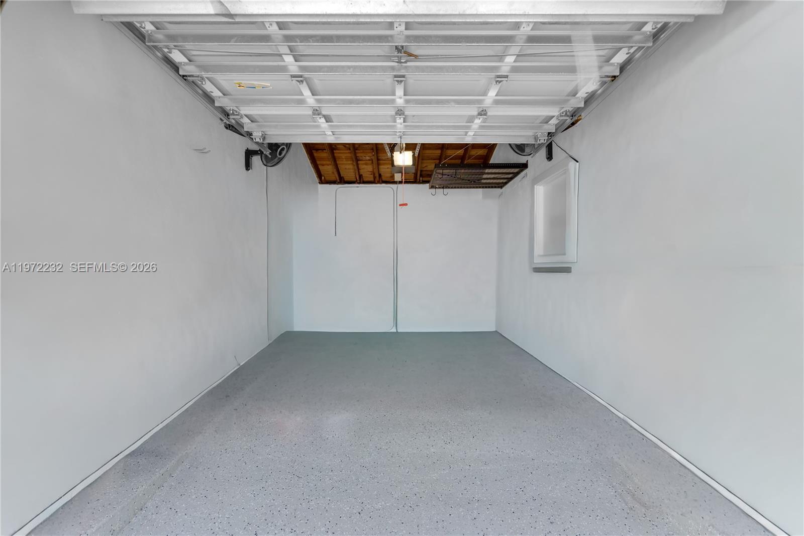 6376 Southwest 20th Street Miami, FL 33155 - Photo 25 of 42 an empty room with windows