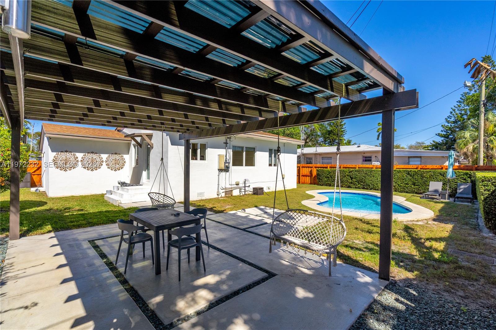 6376 Southwest 20th Street Miami, FL 33155 - Photo 3 of 42 a view of swimming pool with patio