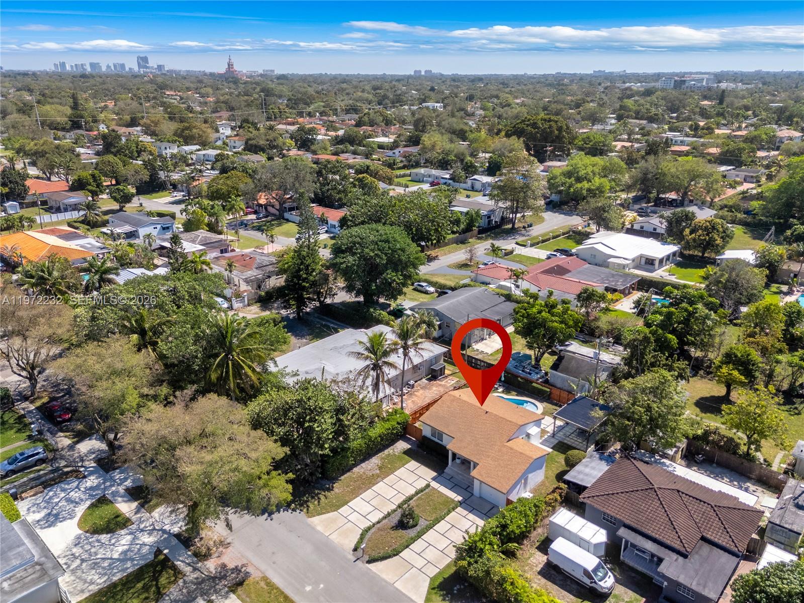 6376 Southwest 20th Street Miami, FL 33155 - Photo 32 of 42 an aerial view of a city with lots of residential buildings