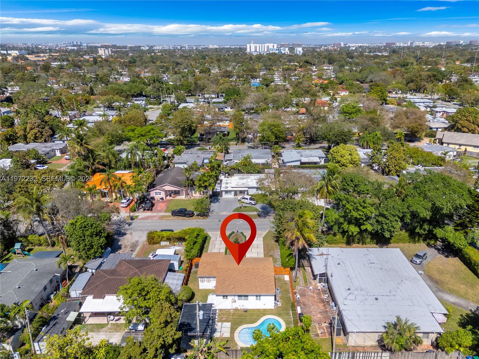 6376 Southwest 20th Street Miami, FL 33155 - Photo 36 of 42 an aerial view of residential house with outdoor space and trees